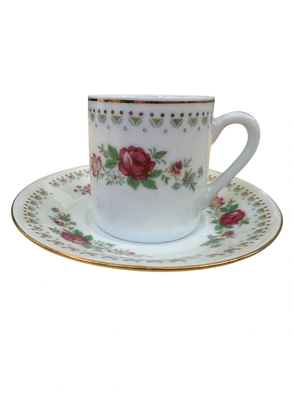 Vintage Espresso Cup and Matching Saucer. White Porcelain with Floral Motif.